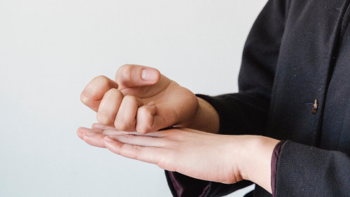 Photo by Kevin  Malik: https://www.pexels.com/photo/woman-hands-showing-sigh-language-gesture-9017383/