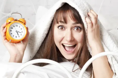 depositphotos 71656509 stock photo young beautiful woman in bed